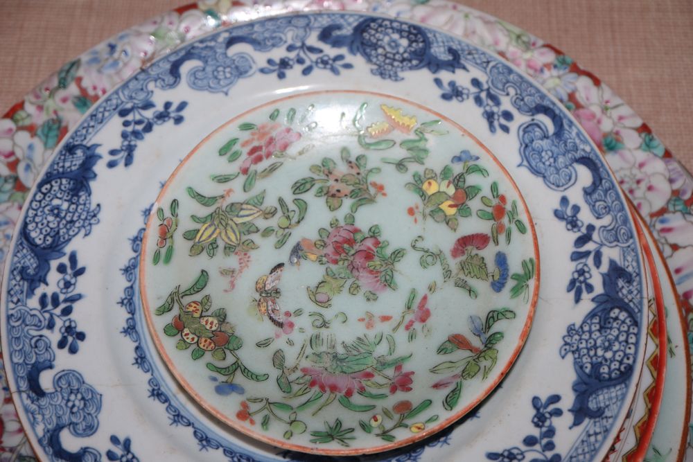 A collection of Oriental chargers and plates,